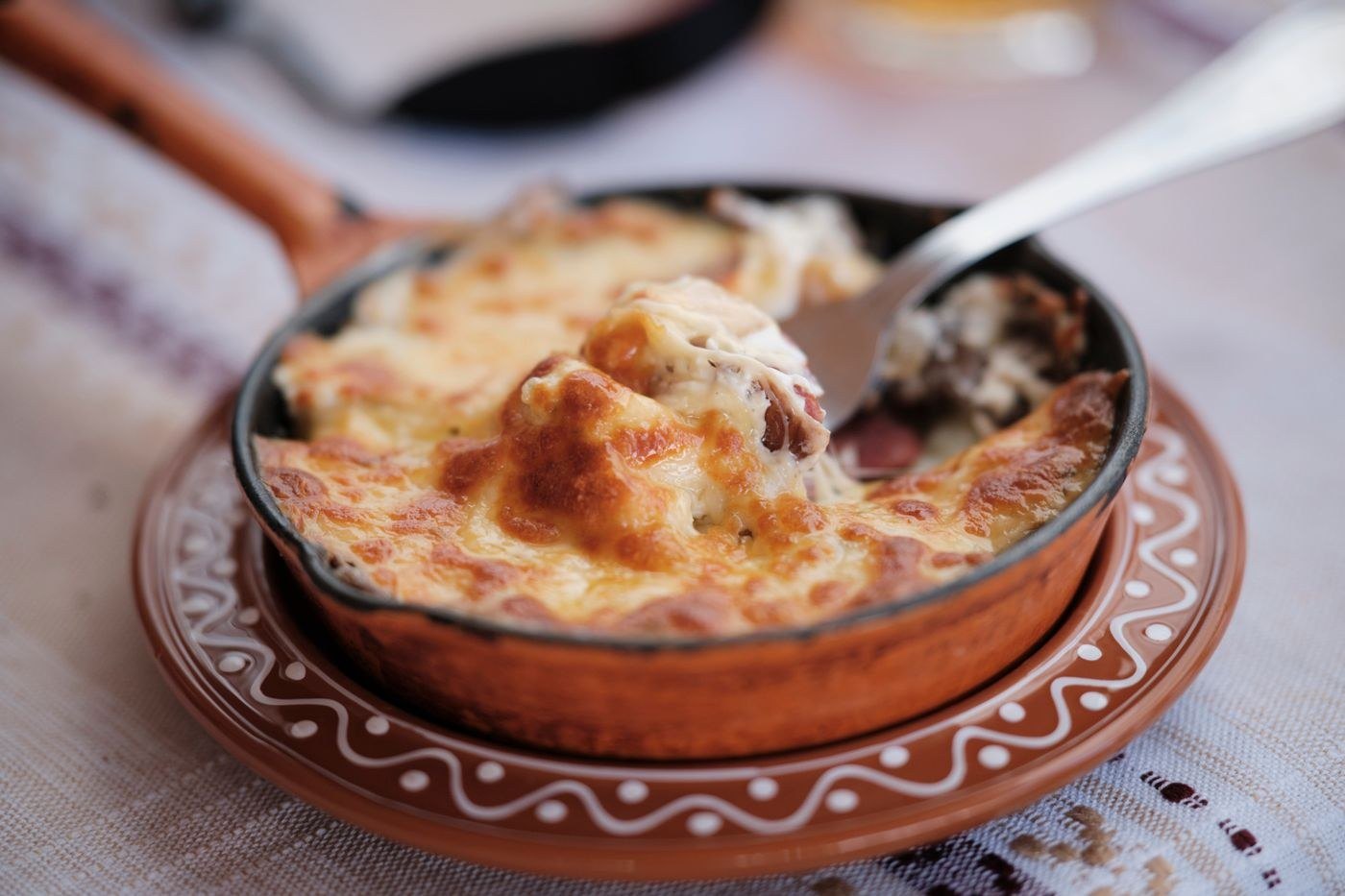 A golden, bubbling baked casserole fresh from the oven